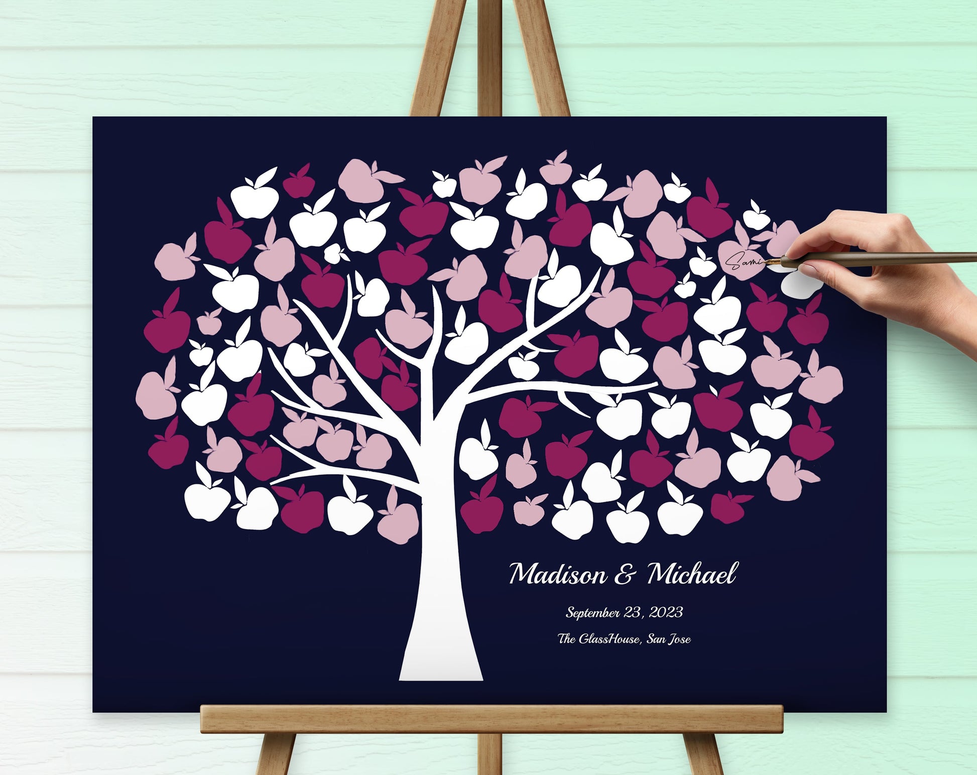 Custom wedding gift canvas guest book in pink and navy blue color.