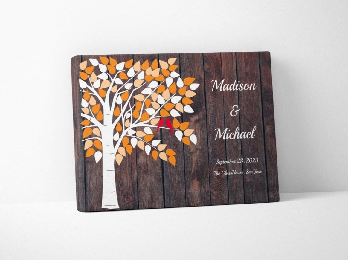 Wedding canvas guest book personalized and colorful orange creme leaves.
