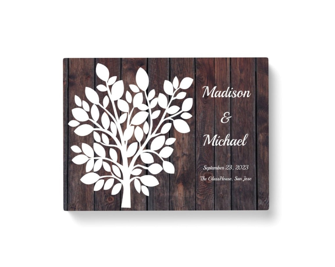 Wedding canvas guest book personalized and white leaves.